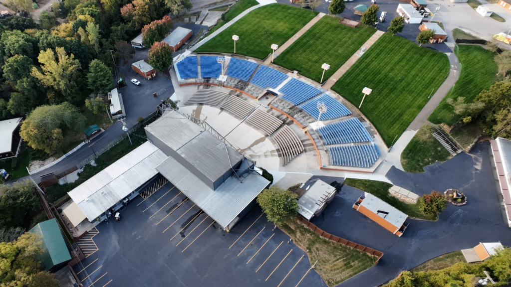 Aerial drone photograph of an outdoor amphitheater in Bonner Springs, Kansas, captured during an event by FAA-certified pilot Reel Drone Rangers.