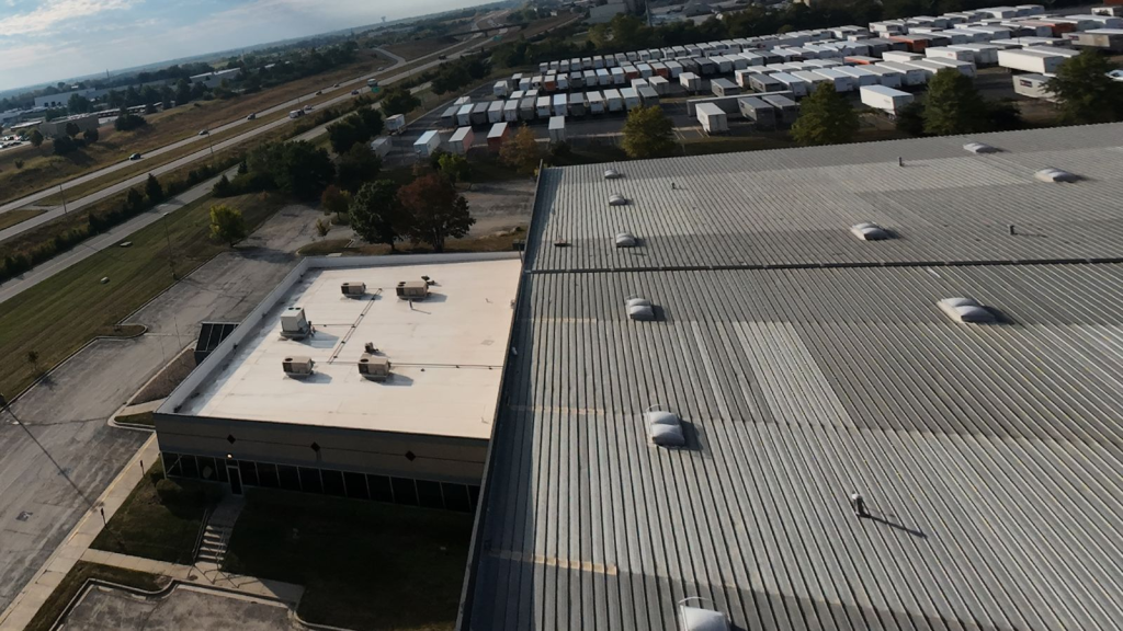 Aerial drone image showing the roof of a commercial building captured in high resolution for inspection and maintenance assessment.